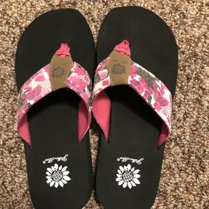Pink yellow box flip flops